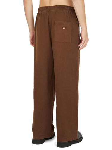 Acne Studios Face Patch Track Pants in Brown | THE FLAMEL®